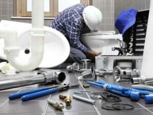 Plumber Replacing Toilet