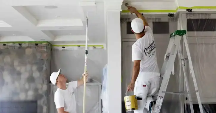 Painting contractors on ladders using software to help work