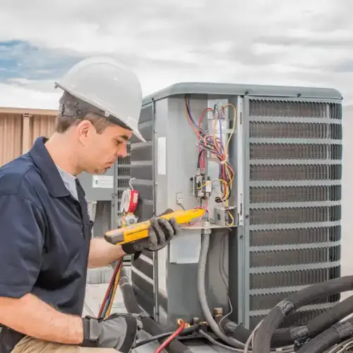 Technician checking equipment history in an HVAC CRM system